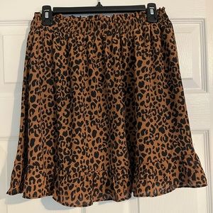 NWT skirt that hits above the knee. The brand is Sienna Sky. Size large.